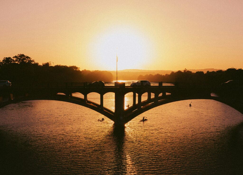 A peaceful bridge at sunrise/sunset