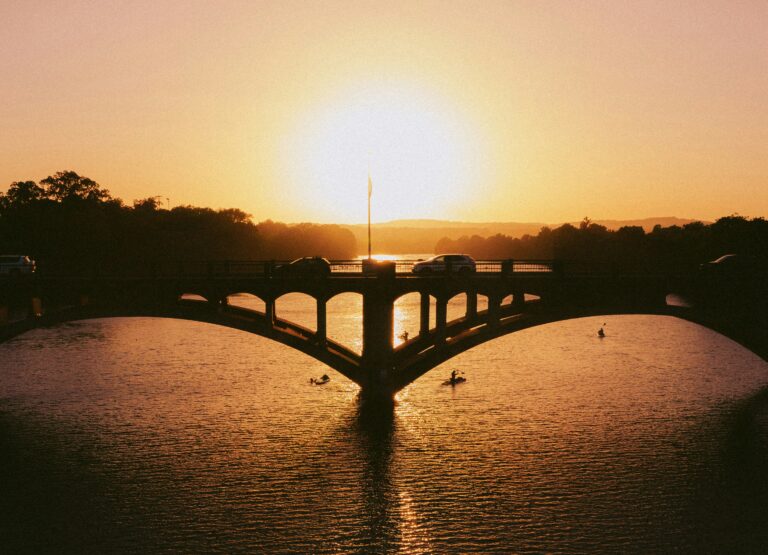 A peaceful bridge at sunrise/sunset